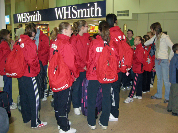 Theyre on the way - the squad checking in at Heathrow
